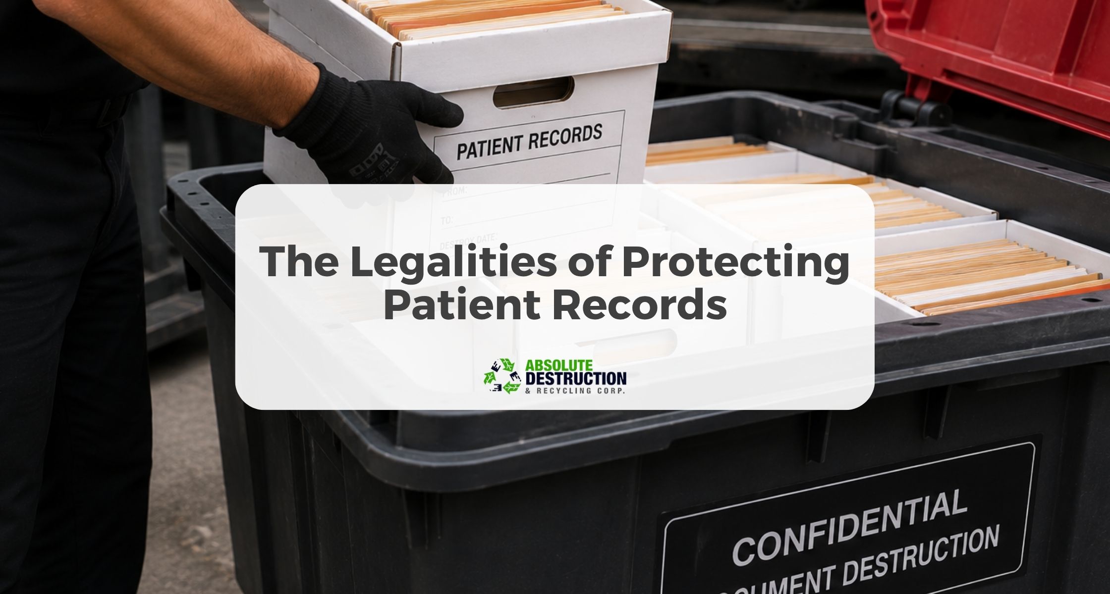 Confidential patient records being placed into a locked bin for secure document destruction